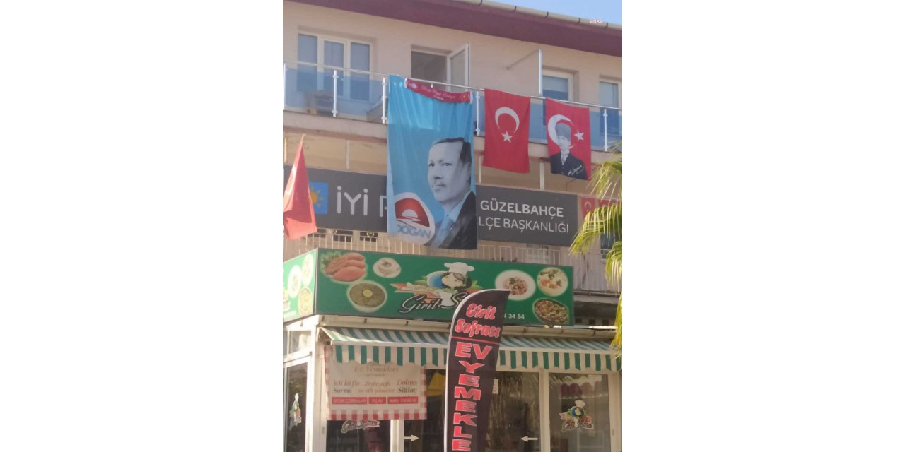 İYİ PARTİ GÜZELBAHÇE İLÇE BAŞKANLIĞI'NIN TABELASI ERDOĞAN POSTERİYLE KAPATILDI