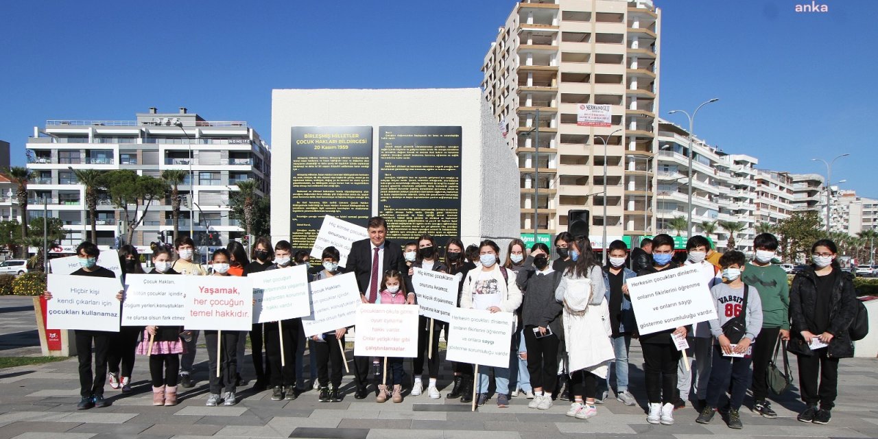 ÇOCUK HAKLARI BİLDİRGESİ KARŞIYAKA'DAKİ İNSAN HAKLARI ANITI'NA ASILDI