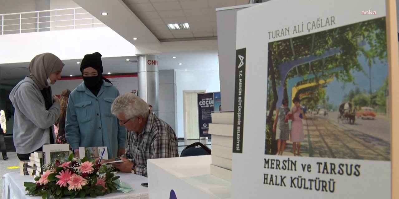 YAZAR TURAN ALİ ÇAĞLAR, “MERSİN VE TARSUS HALK KÜLTÜRÜ” KİTABINI OKURLARI İÇİN İMZALADI