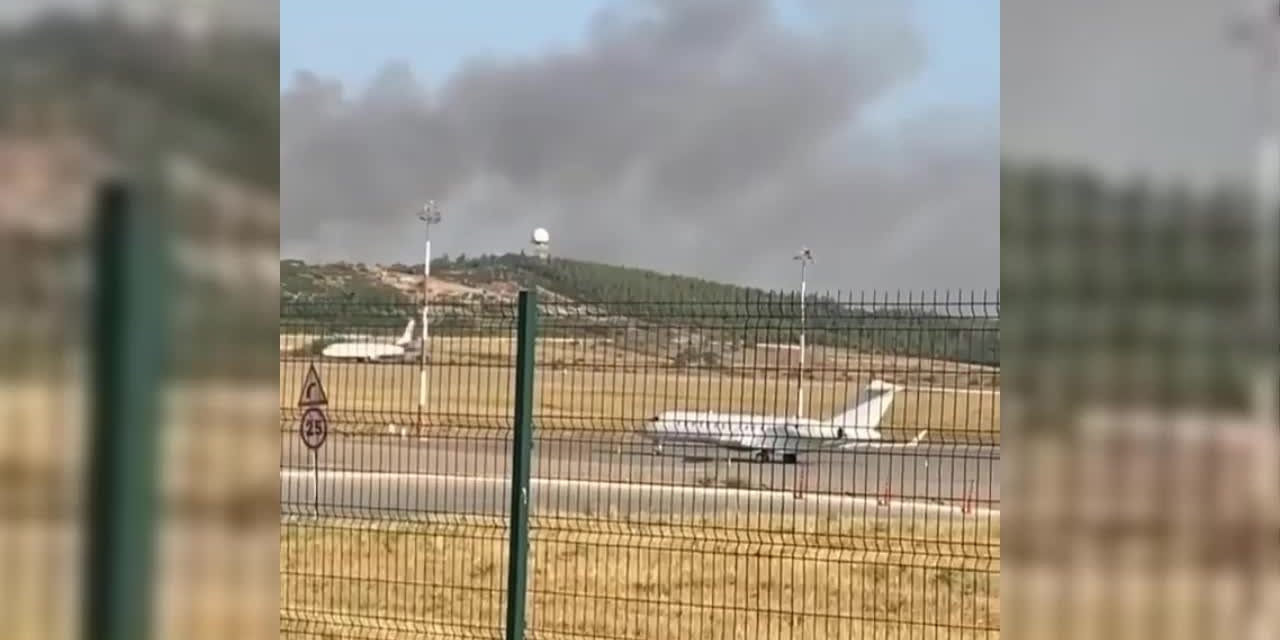 İZMİR'DE HAVALİMANI YAKININDA ÇIKAN ORMAN YANGINI KONTROL ALTINA ALINDI